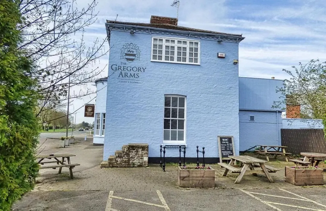 The Gregory Arms-1