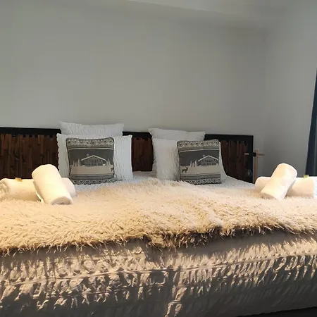 Géraniums Et Neige Fraîche, maison comtoise avec suites appartements de prestige, chambre tout confort, certaines avec spa et sauna privatifs au cœur du Jura à Métabief dans le Haut-Doubs-2