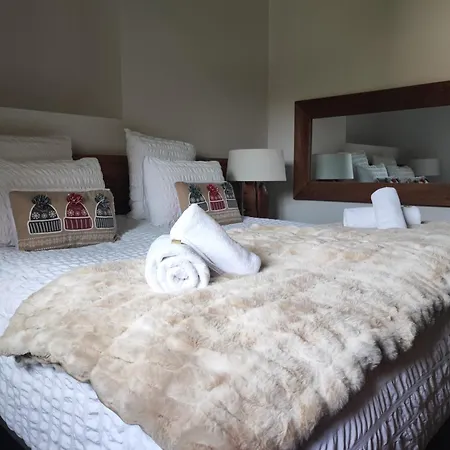 Géraniums Et Neige Fraîche, maison comtoise avec suites appartements de prestige, chambre tout confort, certaines avec spa et sauna privatifs au cœur du Jura à Métabief dans le Haut-Doubs-3