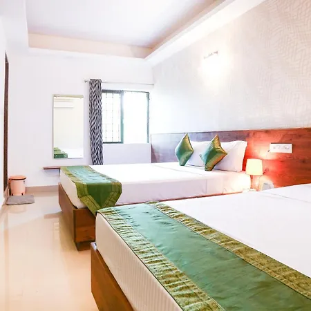 Treebo Comforts Inn, University Road Deralakatte-3