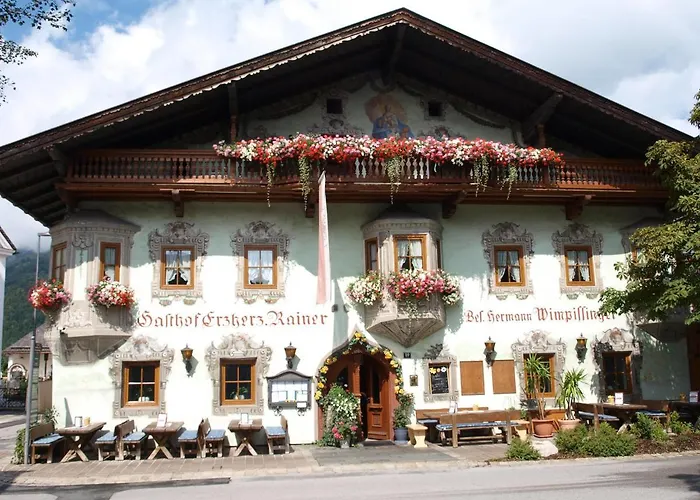 Gasthof Erzherzog Rainer - Zimmer und Ferienwohnung Kössen