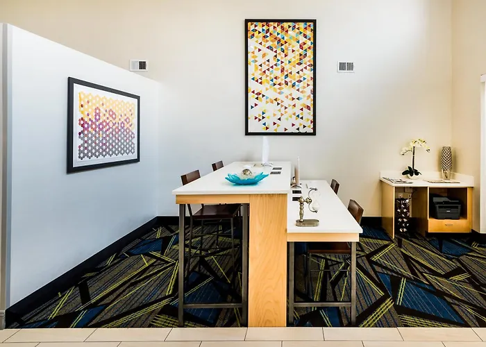 Holiday Inn Express & Suites Charlotte Arpt-Belmont By Ihg