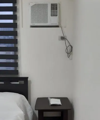 Pioneer Woodlands Aparthotel Manila