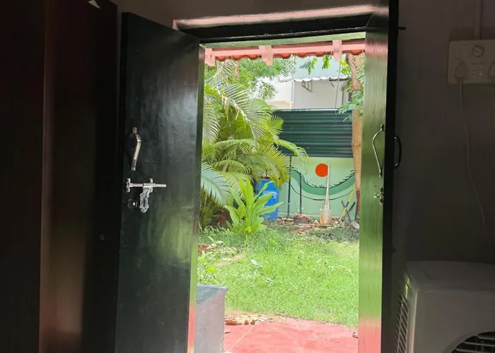 The Lazy Palm Shack Hotel Coimbatore