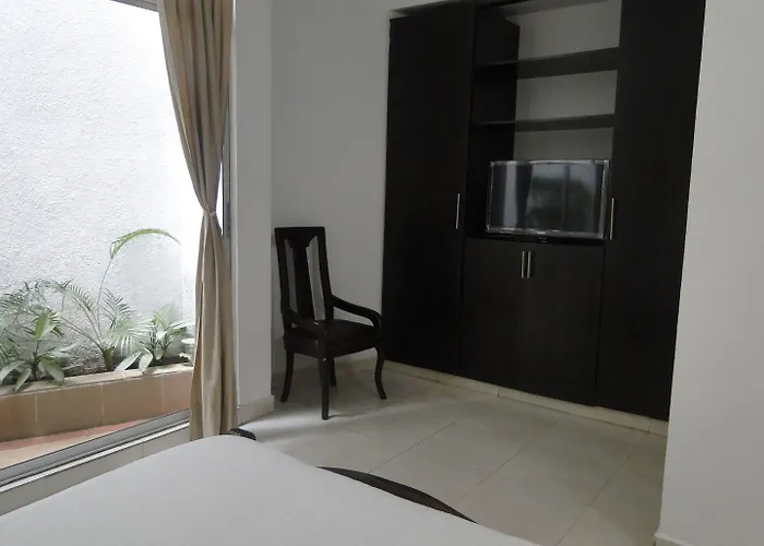 Arco Apartasuites Cali