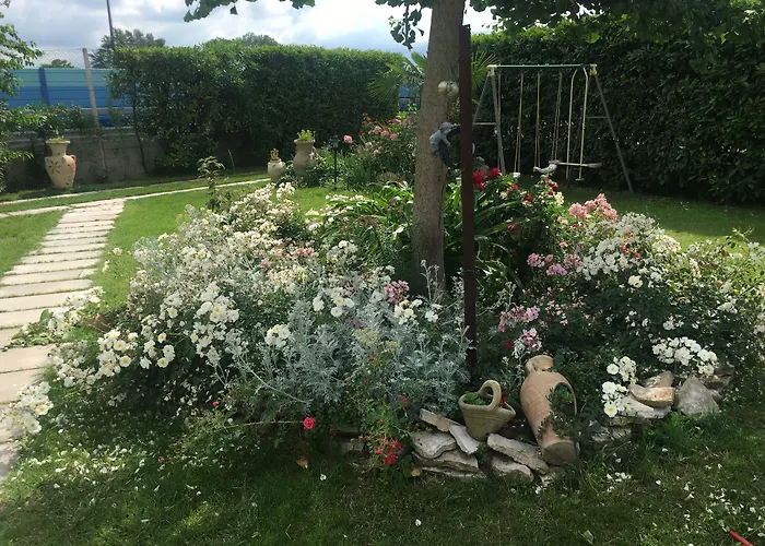 Au Jardin Fleuri Bed & Breakfast San Giovanni Lupatoto