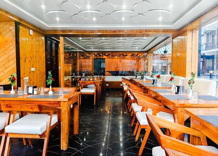 Evoque Hotel ! Near Mall Road Manali With Scenic River And Mountain Views ! Free Parking & Wifi ! Rooftop Bonfire, Music, And Honeymoon Special Rooms And Packages!