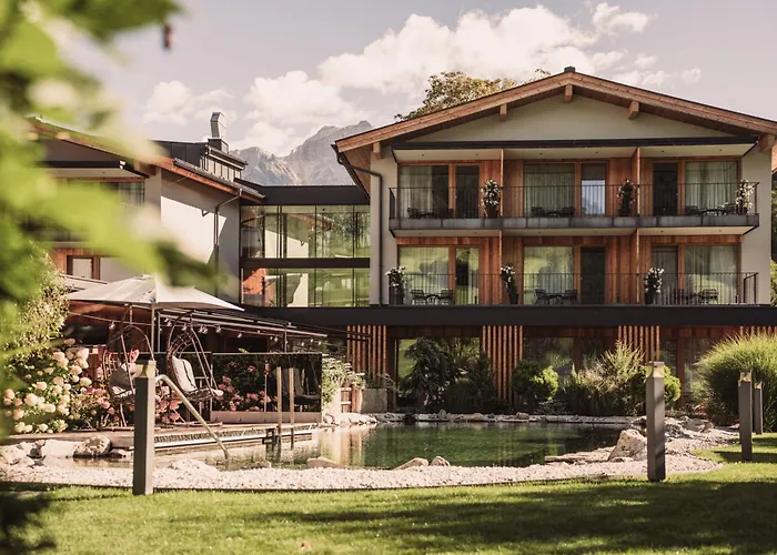 Wellness und Brunch Hotel MorgenZeit beheizter Naturteich Genuss Frühstück bis 13 Uhr Hochkönig Sommercard Maria Alm am Steinernen Meer