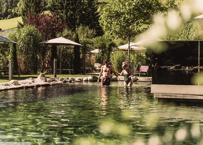 Wellness und Brunch Hotel MorgenZeit beheizter Naturteich Genuss Frühstück bis 13 Uhr Hochkönig Sommercard Maria Alm am Steinernen Meer