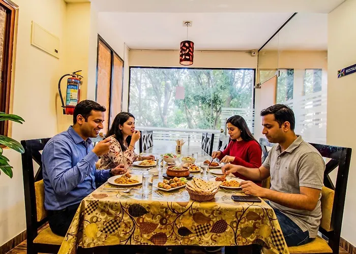 Fabhotel Corporate Crown - Nr Jyoti Nivas University Bangalore